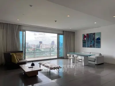 Spacious modern living room with city view and elegant decor