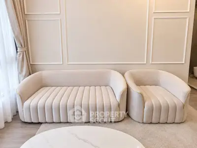 Elegant modern living room with stylish beige sofas and chic decor