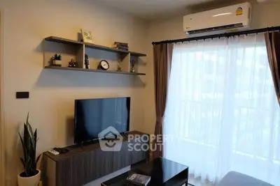 Modern living room with sleek TV setup and stylish shelving