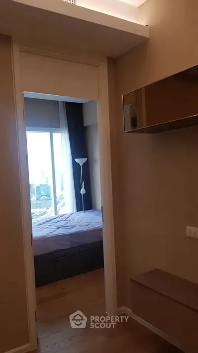 Modern bedroom with city view and minimalist decor