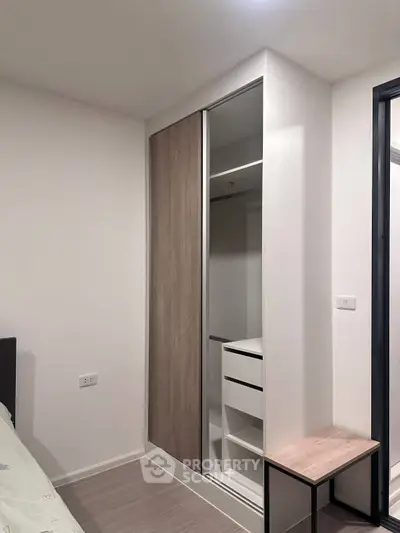 Modern bedroom with built-in closet and minimalist design