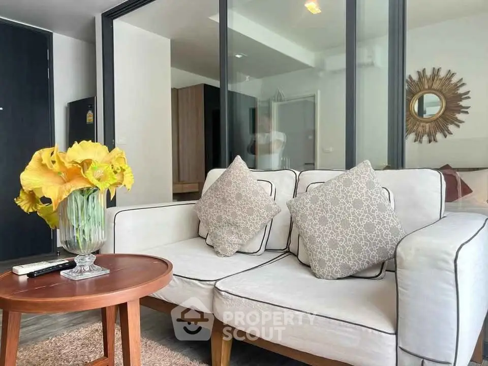 Chic living room with cozy sofa and stylish decor in modern apartment