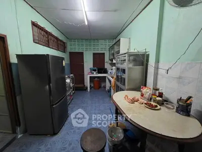 Spacious kitchen with ample storage and modern appliances, perfect for culinary enthusiasts.