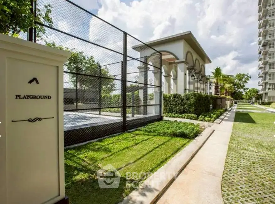 Luxurious residential playground with lush greenery and elegant architecture, perfect for family living.