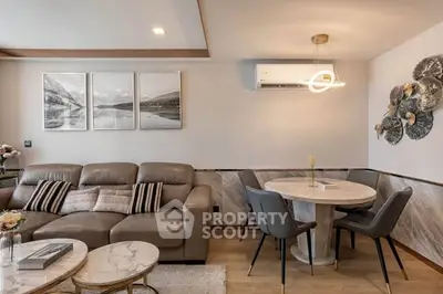 Modern living room with elegant decor and cozy seating area