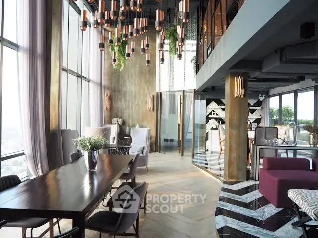 Luxurious modern living room with high ceilings, elegant decor, and panoramic city views.