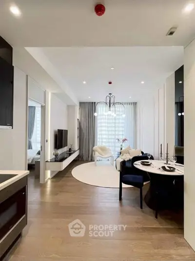 Modern open-plan living room with elegant dining area and stylish decor