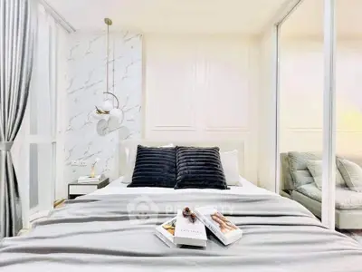 Luxurious modern bedroom with elegant decor and plush bedding in a stylish apartment.