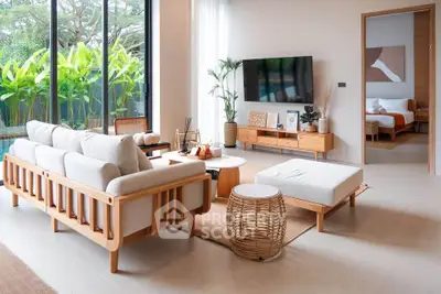 Modern living room with stylish furniture and large window view