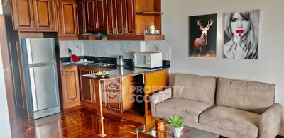 Charming open-layout kitchen and living room with stylish decor and modern appliances.