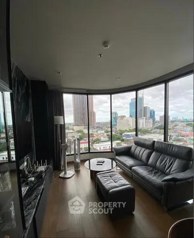 Luxurious living room with panoramic city view and modern furnishings