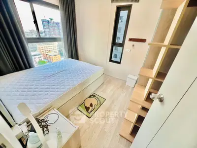 Modern bedroom with large window and city view, featuring stylish shelving and minimalist decor.