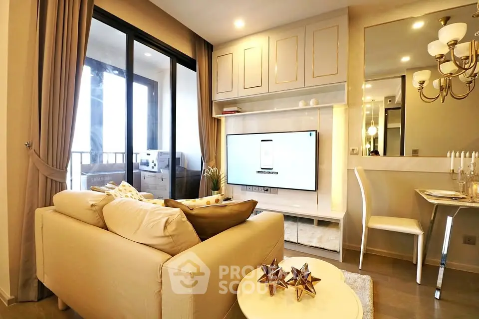 Luxurious modern living room with elegant decor and large TV, perfect for relaxation and entertainment.