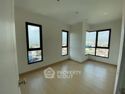 Spacious corner unit with panoramic city views and abundant natural light.