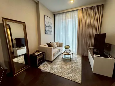 Elegant living room with modern decor and large window, featuring a cozy sofa and stylish TV unit.