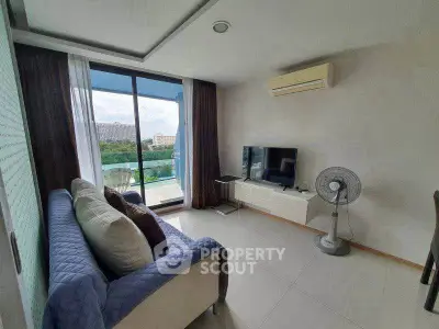 Modern living room with balcony view and stylish furniture
