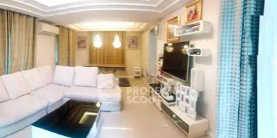 Luxurious living room with modern decor and spacious seating area