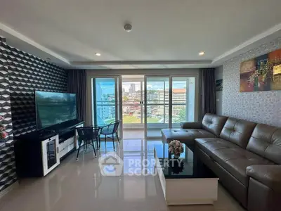 Spacious modern living room with city view and stylish decor