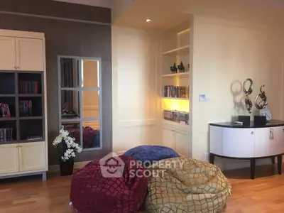 Stylish living room with modern decor and cozy seating area.