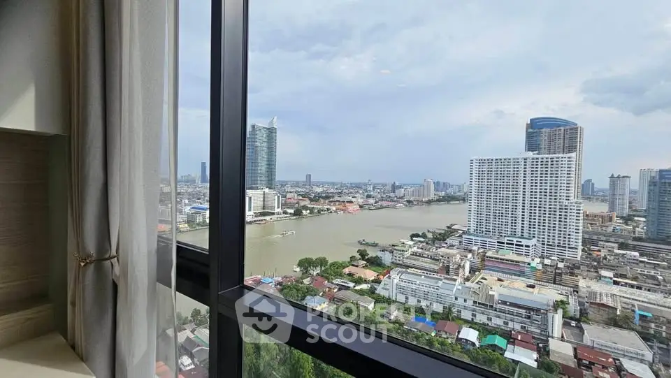 Stunning river and cityscape view from high-rise apartment window