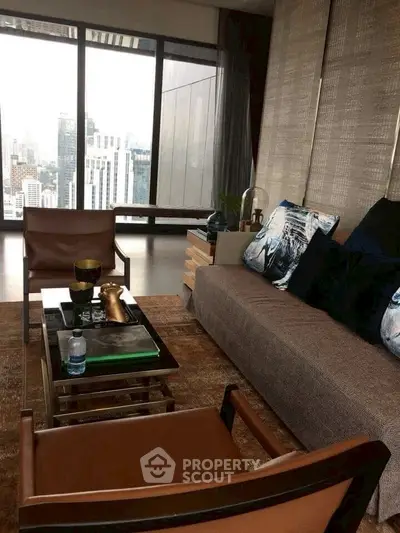 Luxurious living room with city view, modern furniture, and elegant decor.