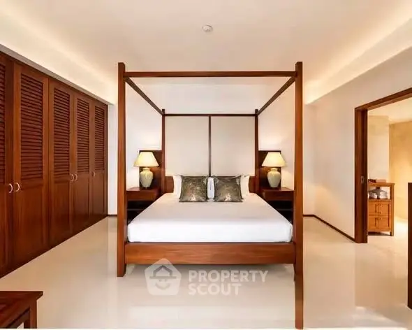 Luxurious bedroom with elegant wooden furniture and spacious layout