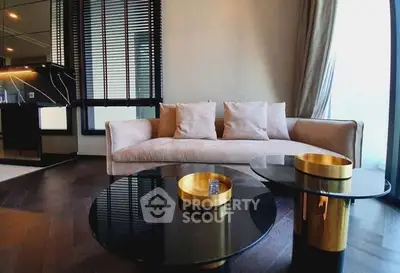 Luxurious modern living room with elegant decor and plush sofa