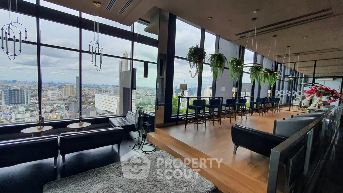 Luxurious high-rise living room with panoramic city views and modern decor