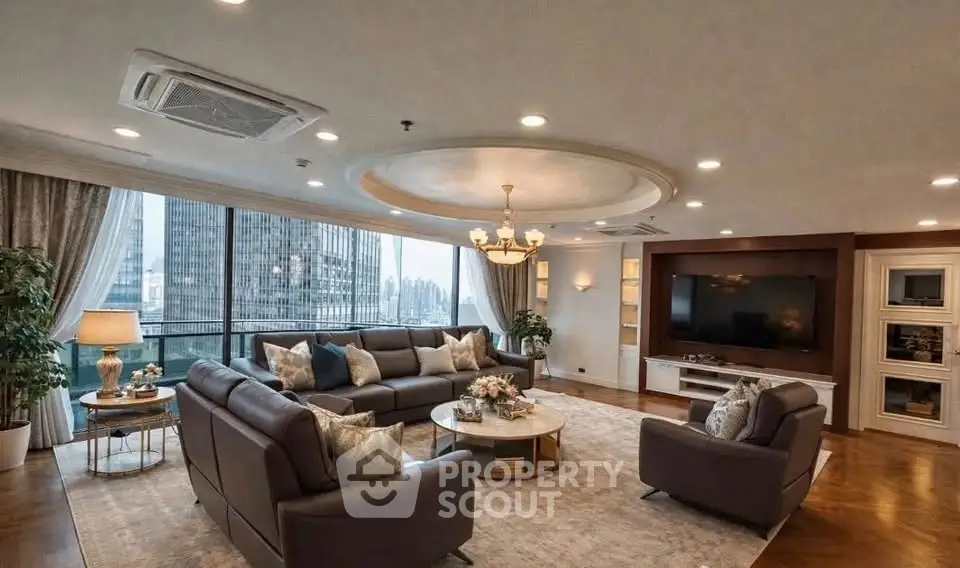 Luxurious living room with elegant decor and stunning city view, featuring spacious seating and modern lighting.