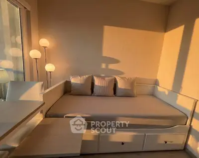 Cozy sunlit bedroom with modern furniture and stylish decor