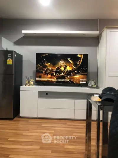 Modern living room with sleek TV setup and stylish decor