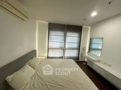 Cozy bedroom with modern decor and natural light