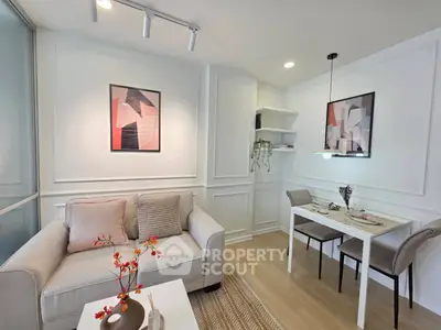 Stylish modern living room with cozy dining area and elegant decor
