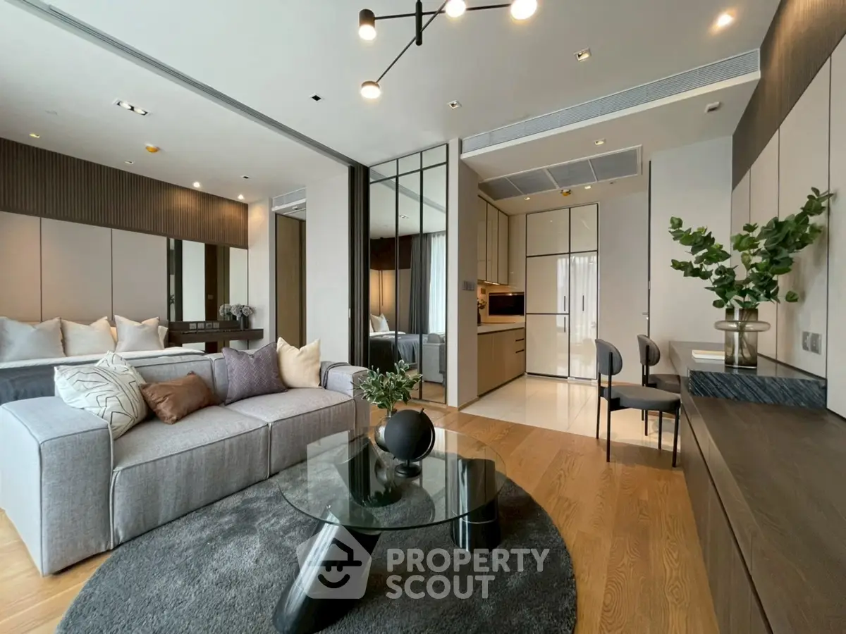 Modern living room with stylish decor and open kitchen layout