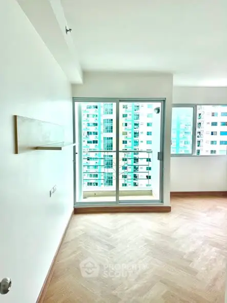 Bright and airy apartment with large windows and city view