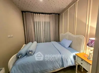 Cozy bedroom with elegant decor and soft lighting, perfect for relaxation.