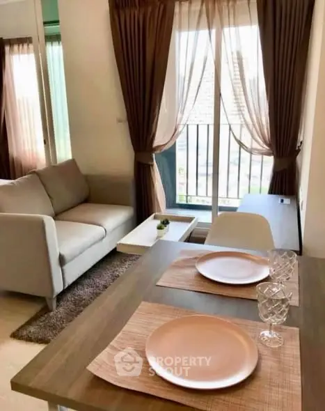 Charming living room with elegant decor and natural light, perfect for cozy gatherings.