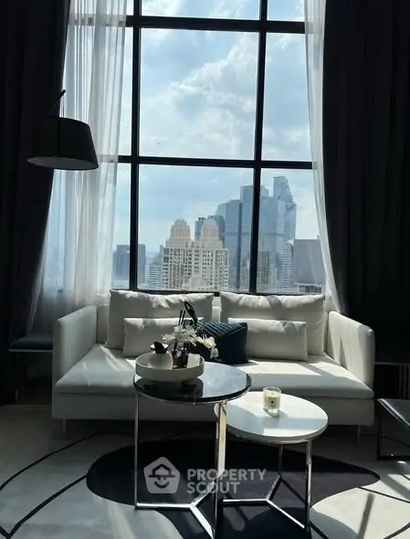 Luxurious living room with stunning city view and elegant decor
