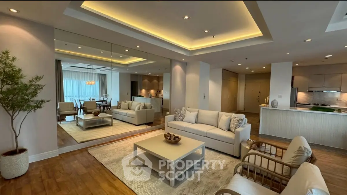 Luxurious modern living room with elegant decor and open kitchen layout