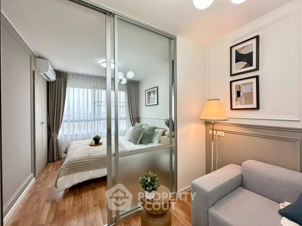 Modern bedroom with sliding glass doors and cozy decor