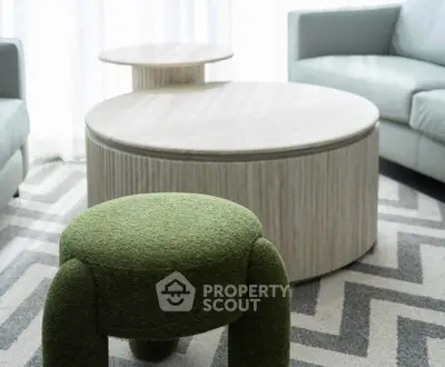 Modern living room with stylish furniture and natural light