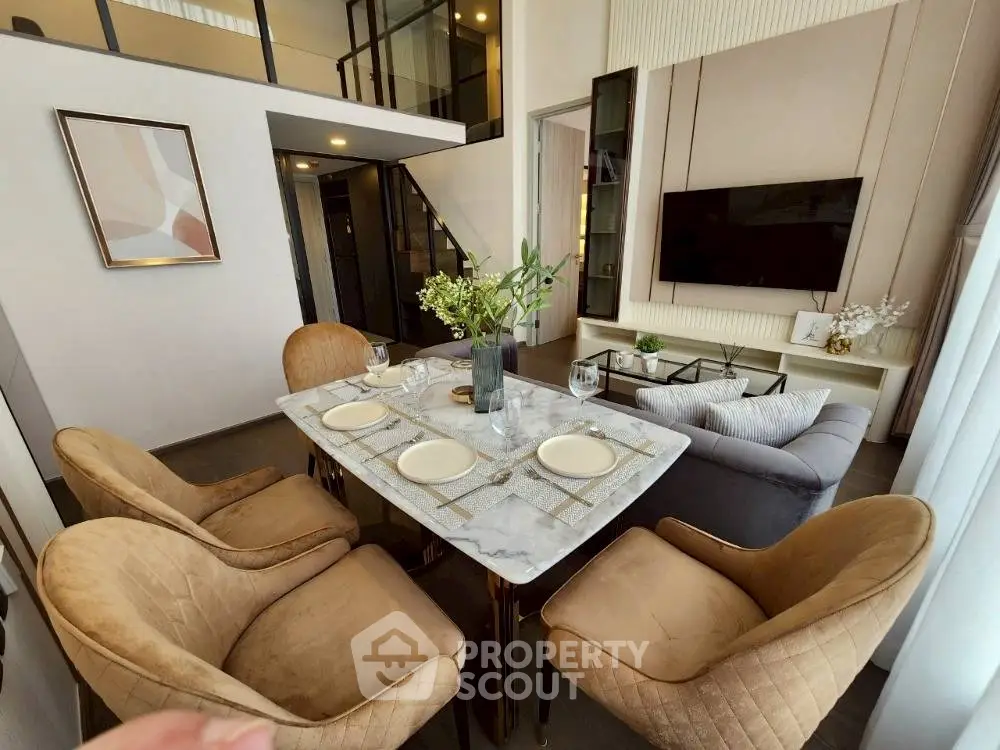 Modern living room with elegant dining area and stylish decor