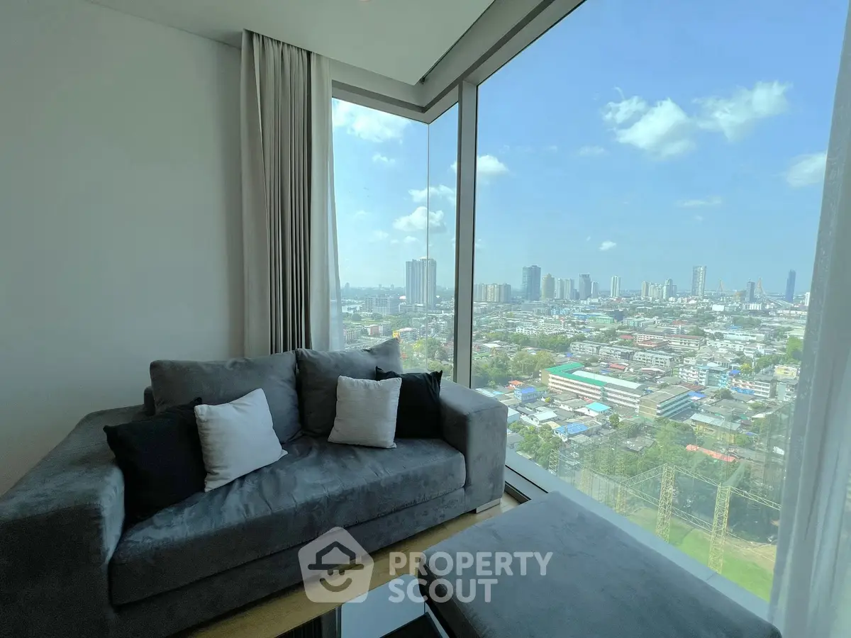 Stunning high-rise apartment with panoramic city views and modern furnishings.