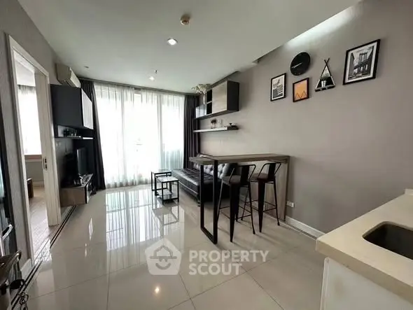 Modern living room with sleek furniture and natural light