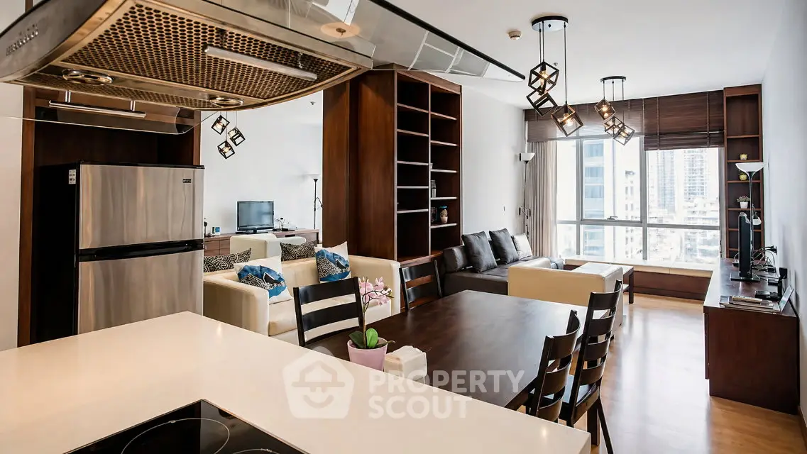 Modern open-layout living room with stylish kitchen and city view