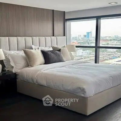 Luxurious bedroom with city view and elegant decor