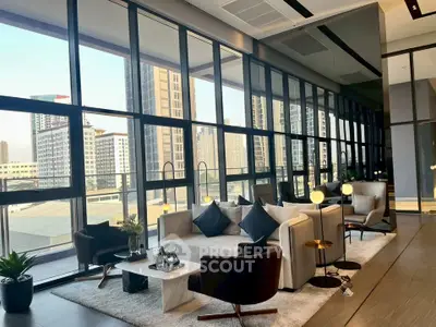 Luxurious modern living room with floor-to-ceiling windows and stunning city view