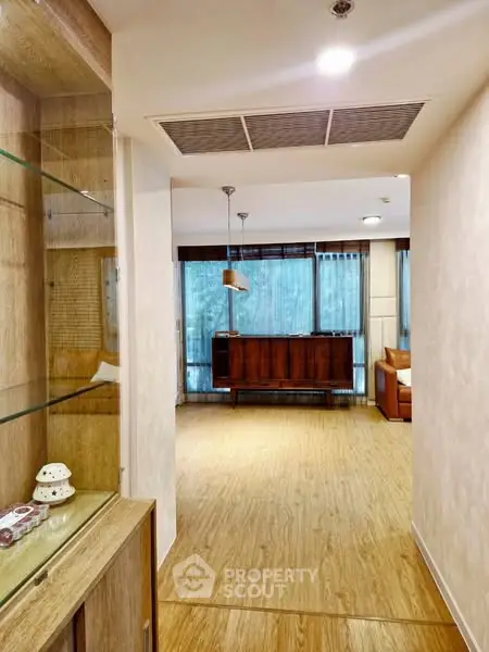 Spacious living room with wooden flooring and modern decor