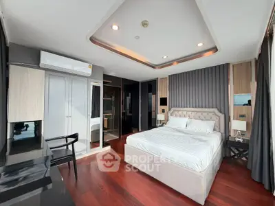 Luxurious modern bedroom with elegant decor and stunning hardwood floors