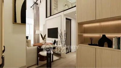 Modern living room with high ceiling and stylish decor in a contemporary apartment.